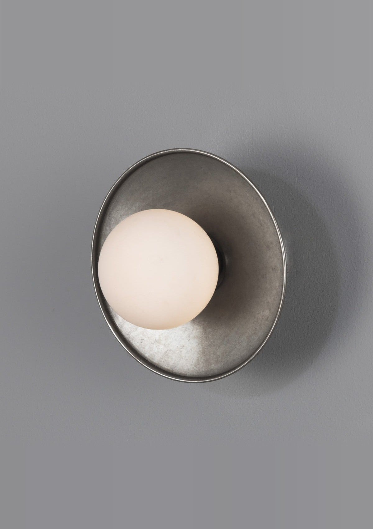 Aosta Brass Disc Bathroom Wall Sconce with Glass Globe