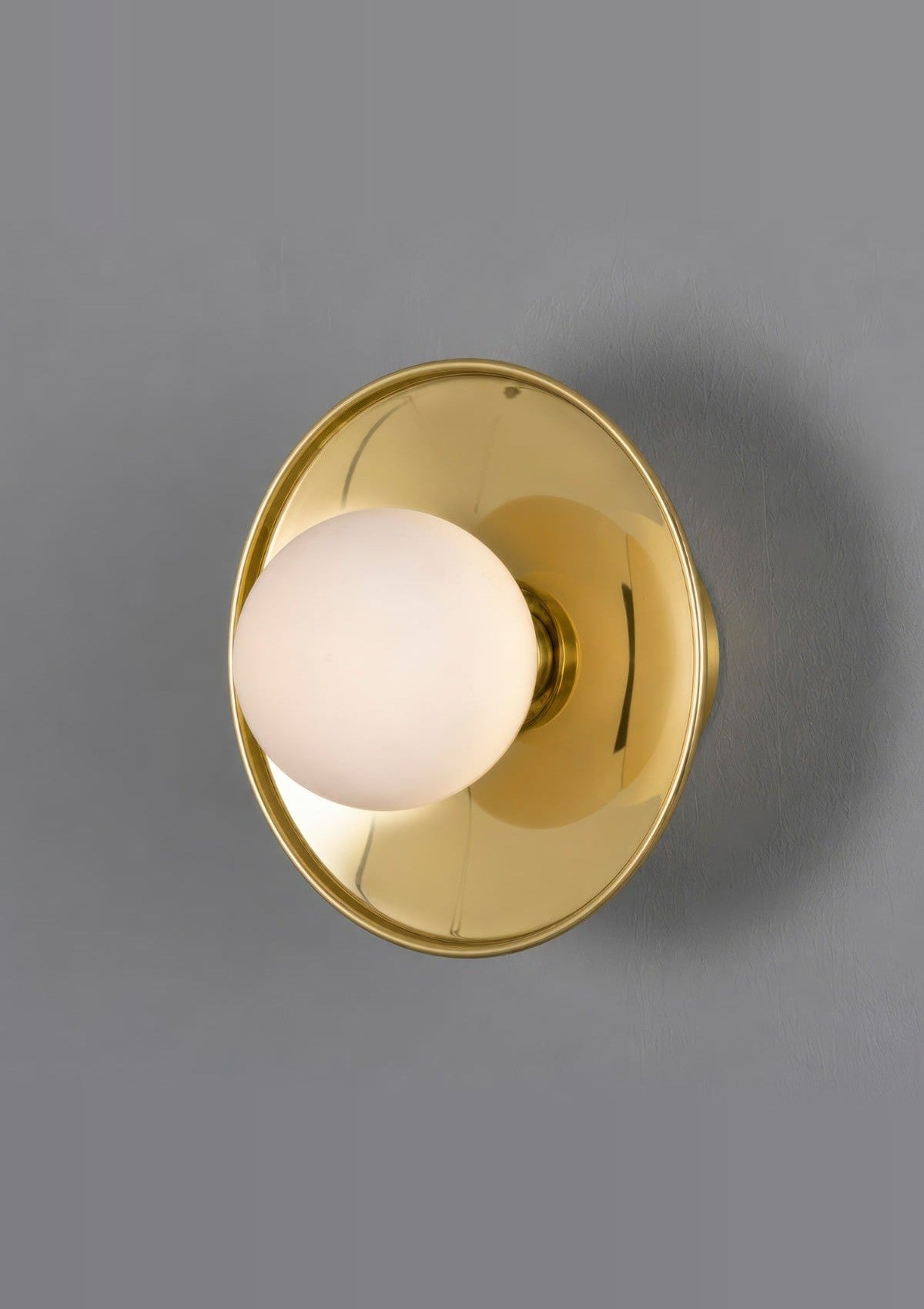 Aosta Brass Disc Bathroom Wall Sconce with Glass Globe