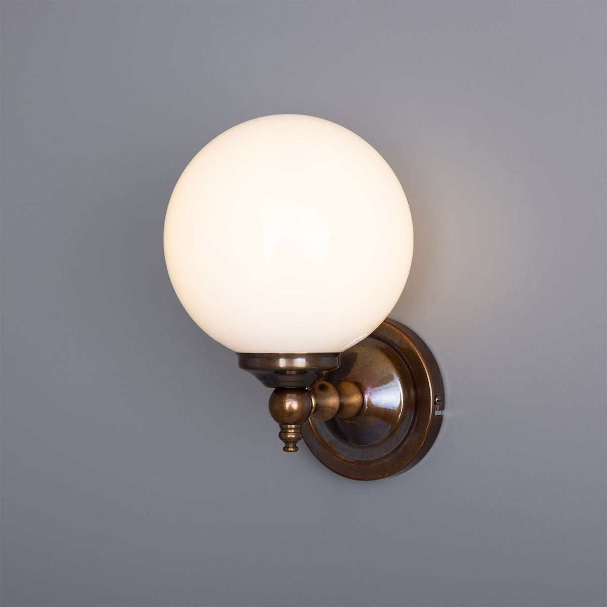 Cloghan Traditional Brass and Opal Glass Globe Wall Sconce – Antique Brass