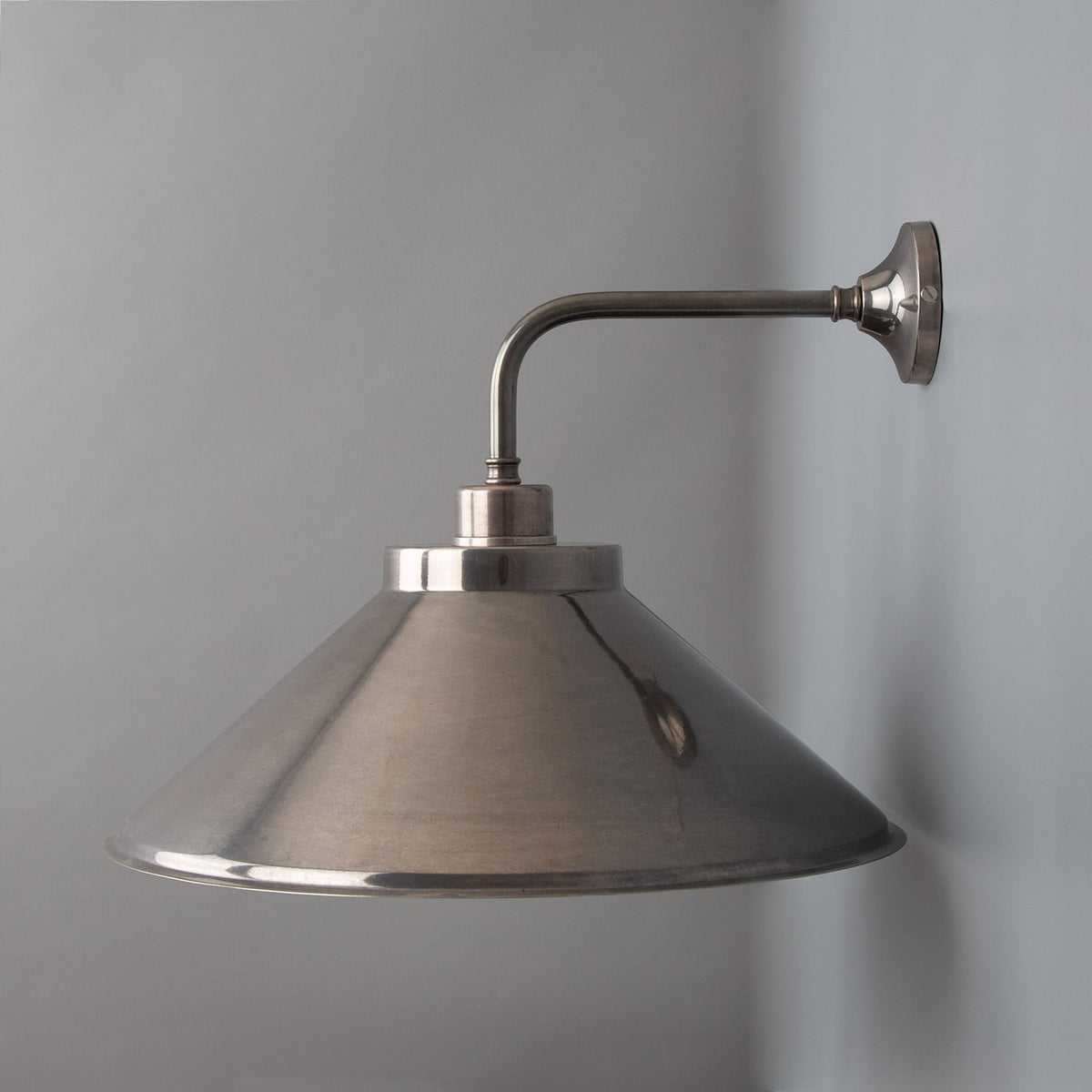 Rio Brass Wall Sconce with Curved Shade – Antique Silver