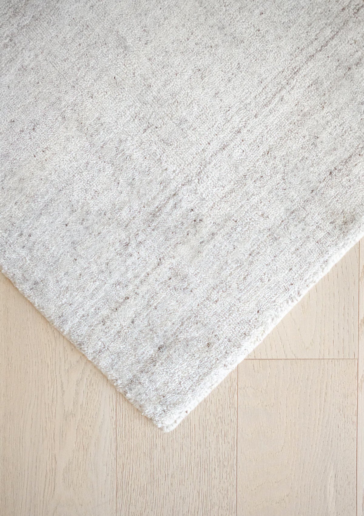 The Armon Rug is hand knotted and has a stunning lustrous sheen.