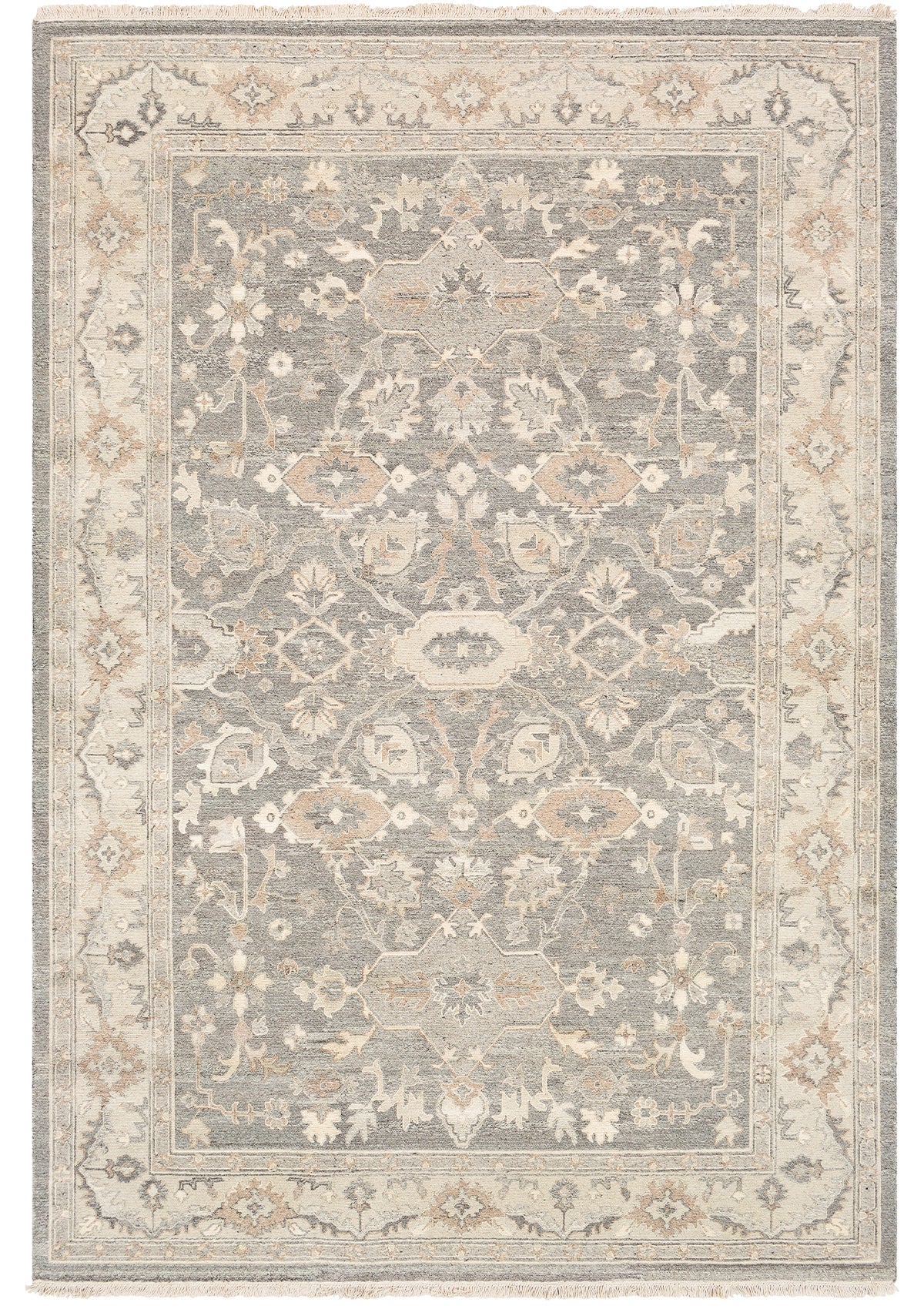 The Avant rug features a floral leafy design with fringed ends.
