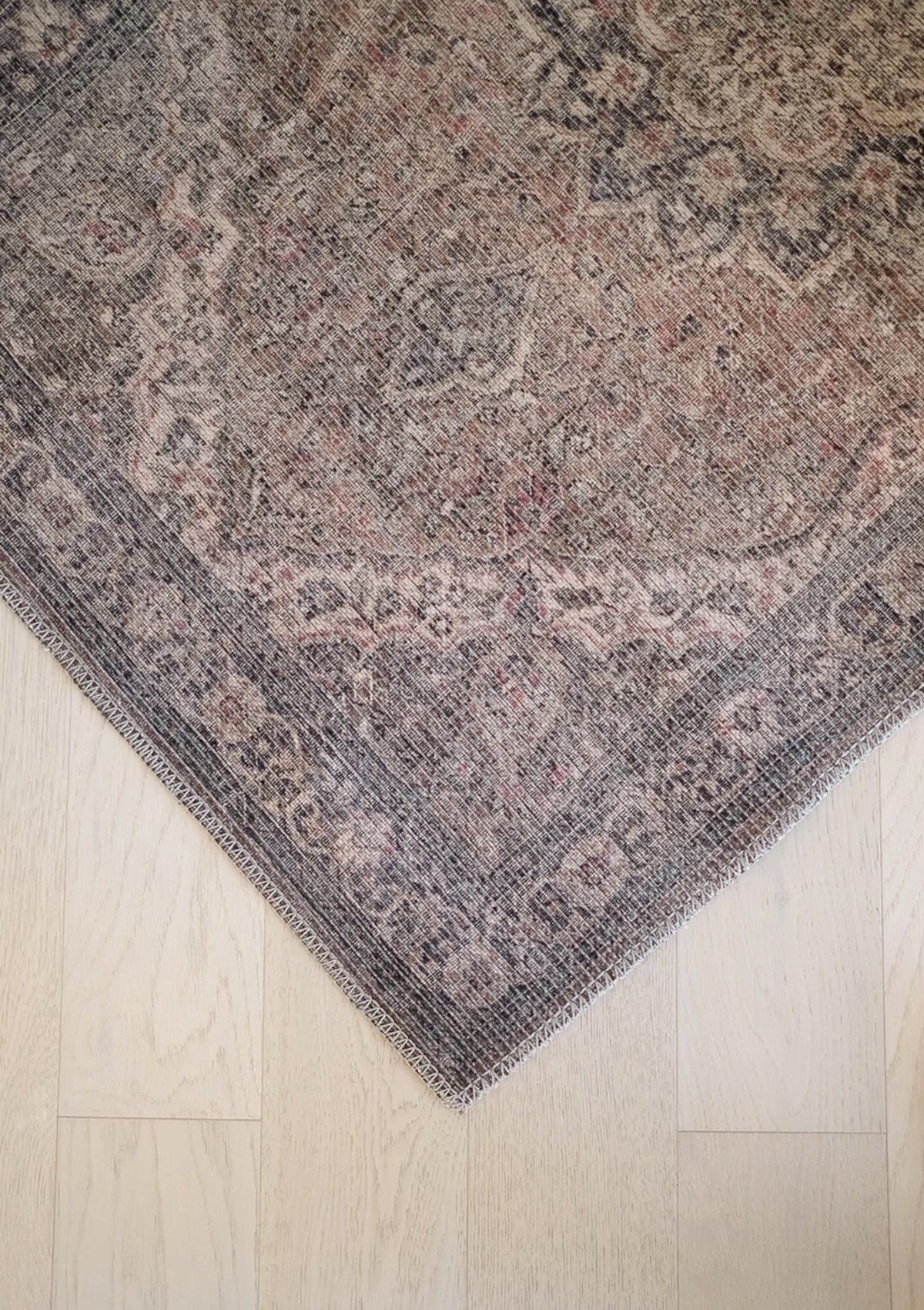 The Lennon Rug has a fadded antique wash that creates a beautiful vintage feel.