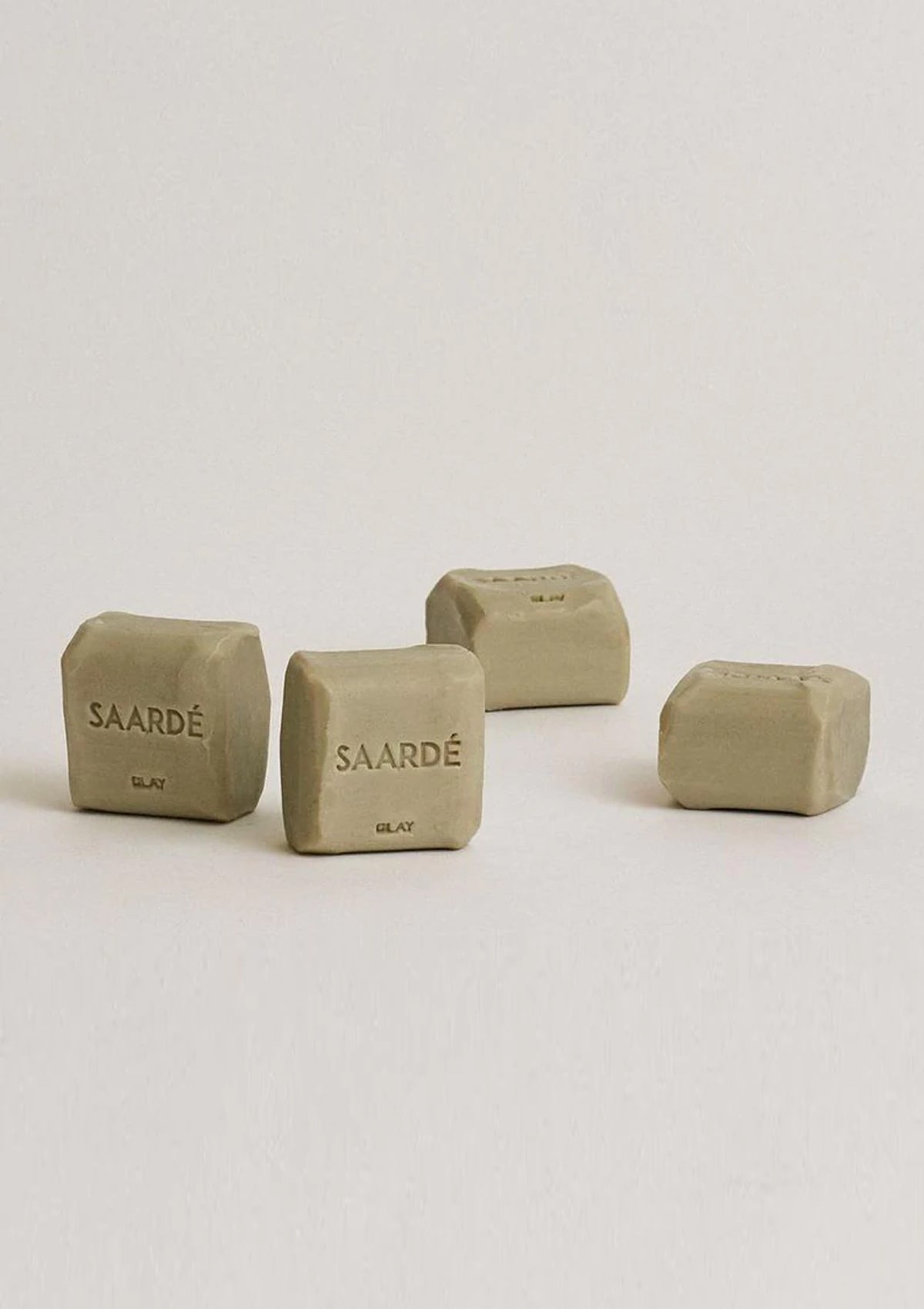 The Olive Oil Bar Soap with bentonite clay helps to exfoliate and remove excess oil from the skin.