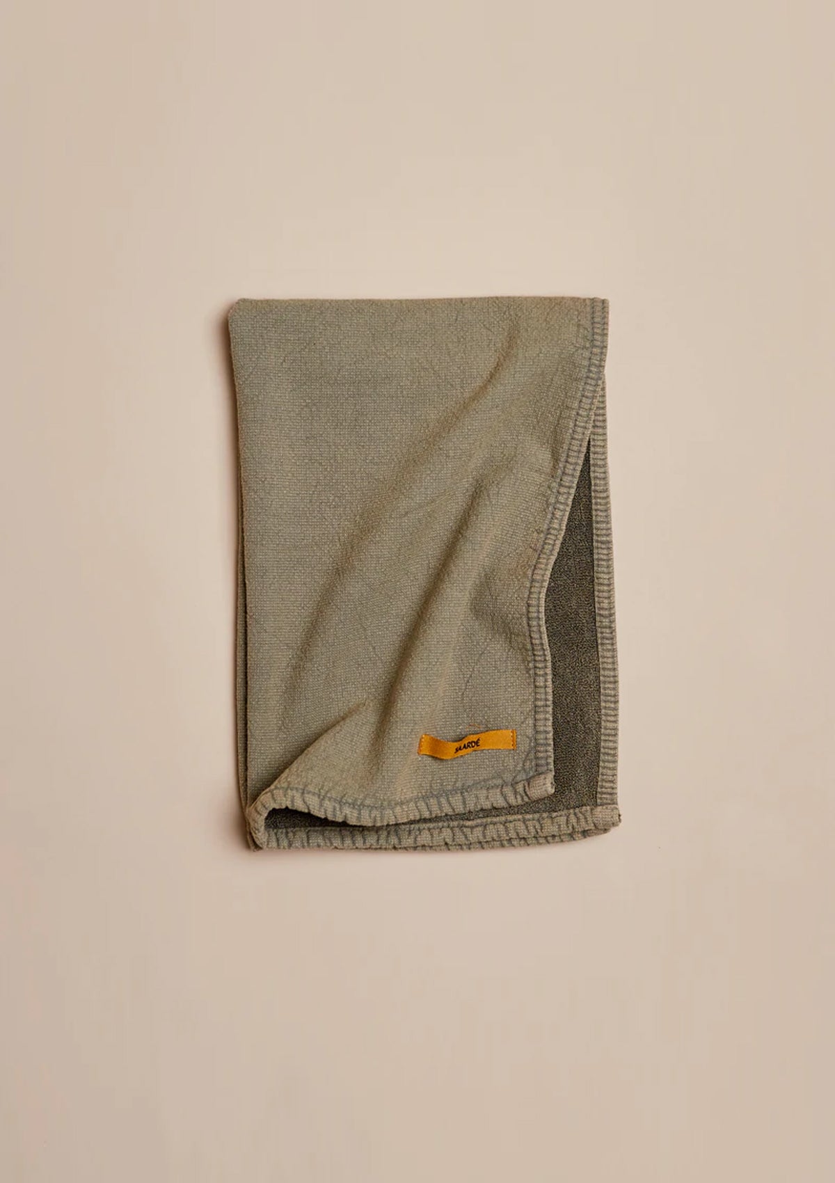 The Olive Vinage Wash Tea Towel is made from super soft and absorbant cotton.