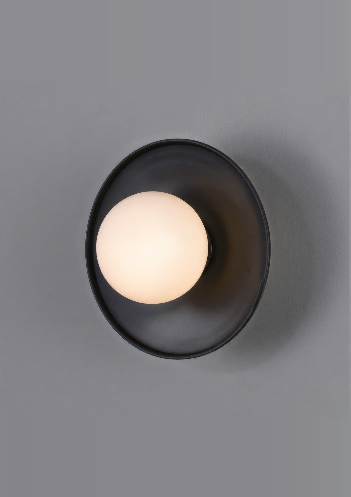 Aosta Brass Disc Bathroom Wall Sconce with Glass Globe