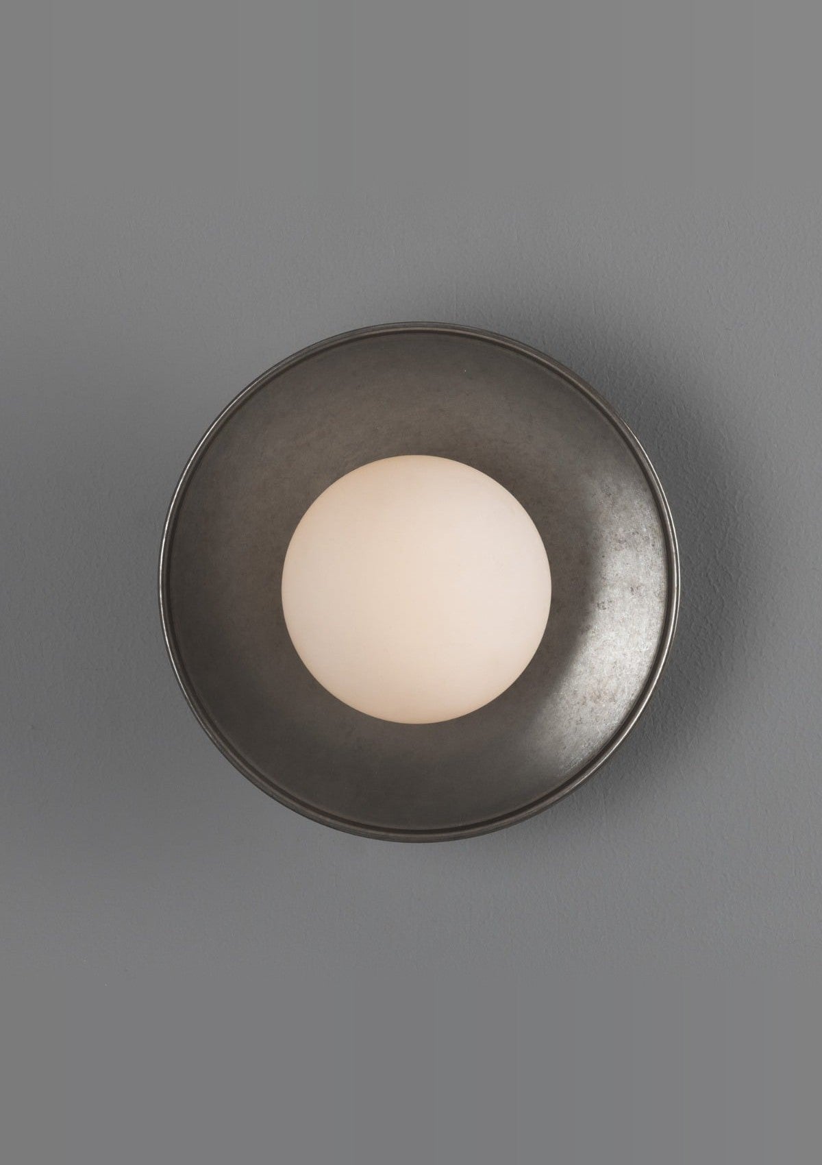 Aosta Brass Disc Bathroom Wall Sconce with Glass Globe