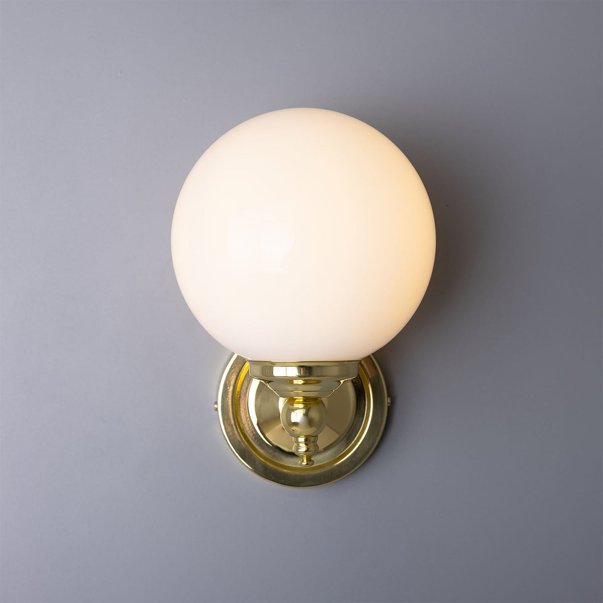 Cloghan Traditional Brass and Opal Glass Globe Wall Sconce – Polished Brass
