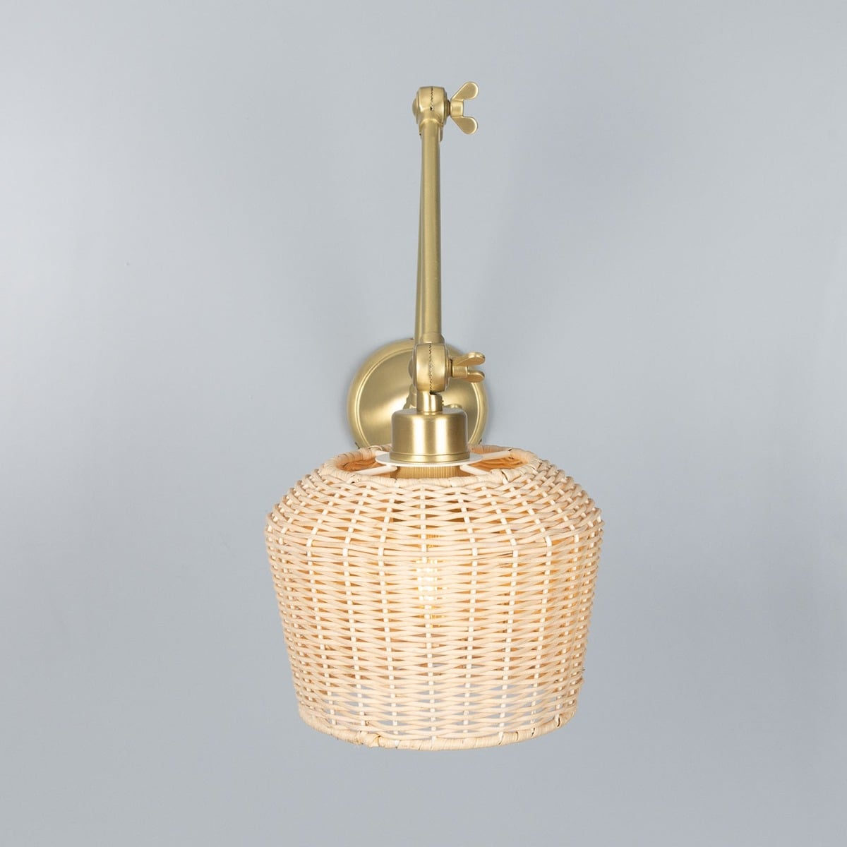 Manila Adjustable Arm Wall Sconce with Small Rattan Shade – Satin Brass