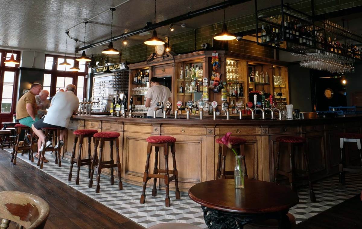 Nassau Industrial Factory Pendant Light – in a Restaurant above a Bar