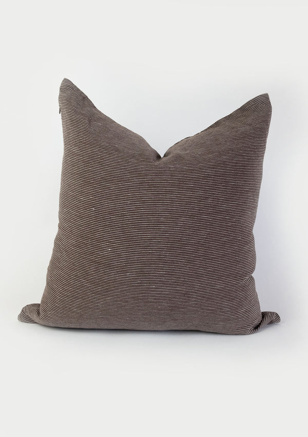 The Chocolate Adora pillow cover is made from soft linen and has a warm brown colour. 