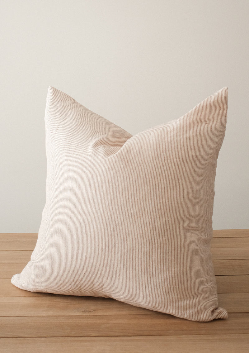The Adora Pillow cover in oat is made up of warm cream tones. 