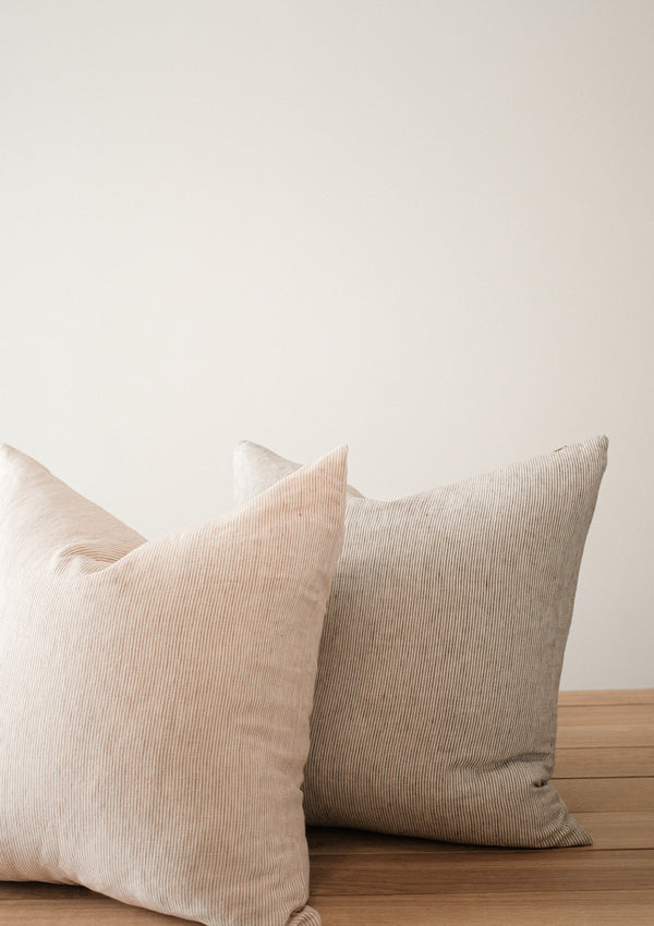 The Adora Pillow Cover is made from soft linen with a ribbed texture.