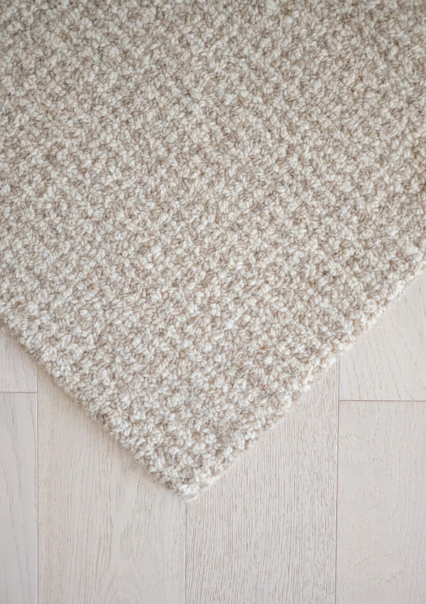 The Akoni rug is made from hand tufted soft wool.
