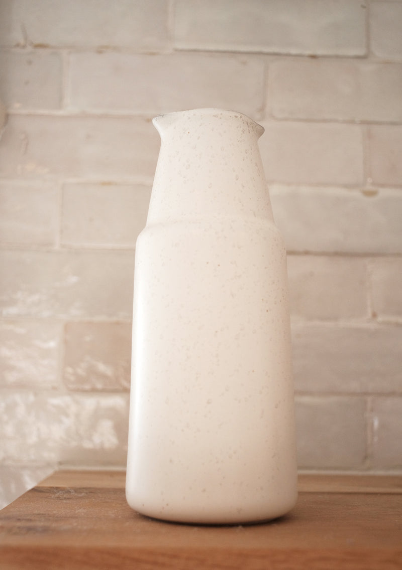 The Ansel porcelain bottle is dishwasher safe and can be used to hold liquids.