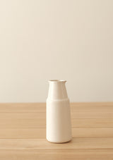 The Ansel Bottle is a small porcelain decorative bottle.