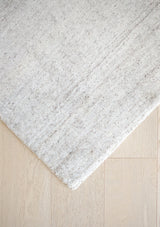 The Armon Rug is hand knotted and has a stunning lustrous sheen.