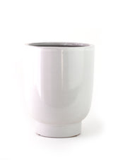 The Artemis Planter is made from earthenware and has an off white glaze. 