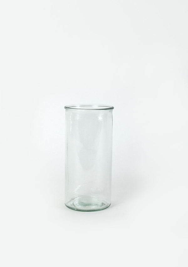 The Aura clear glass vase has a small lip at the opening of the vase. 