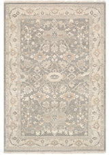 The Avant rug features a floral leafy design with fringed ends.
