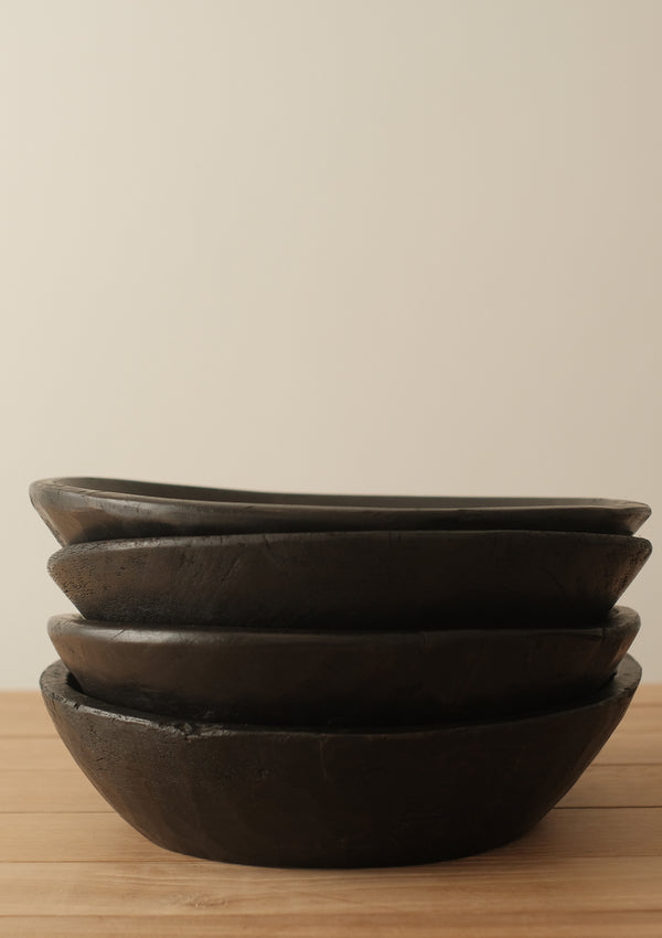 The Blackened Wooden Bowl is found so each bowl varries in size and shape. 