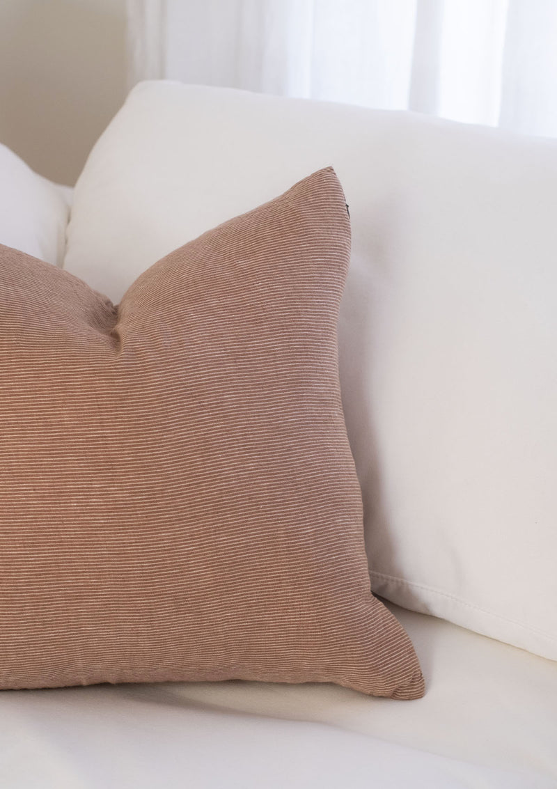 This pillow cover pairs well on its own or with other accent pillows.