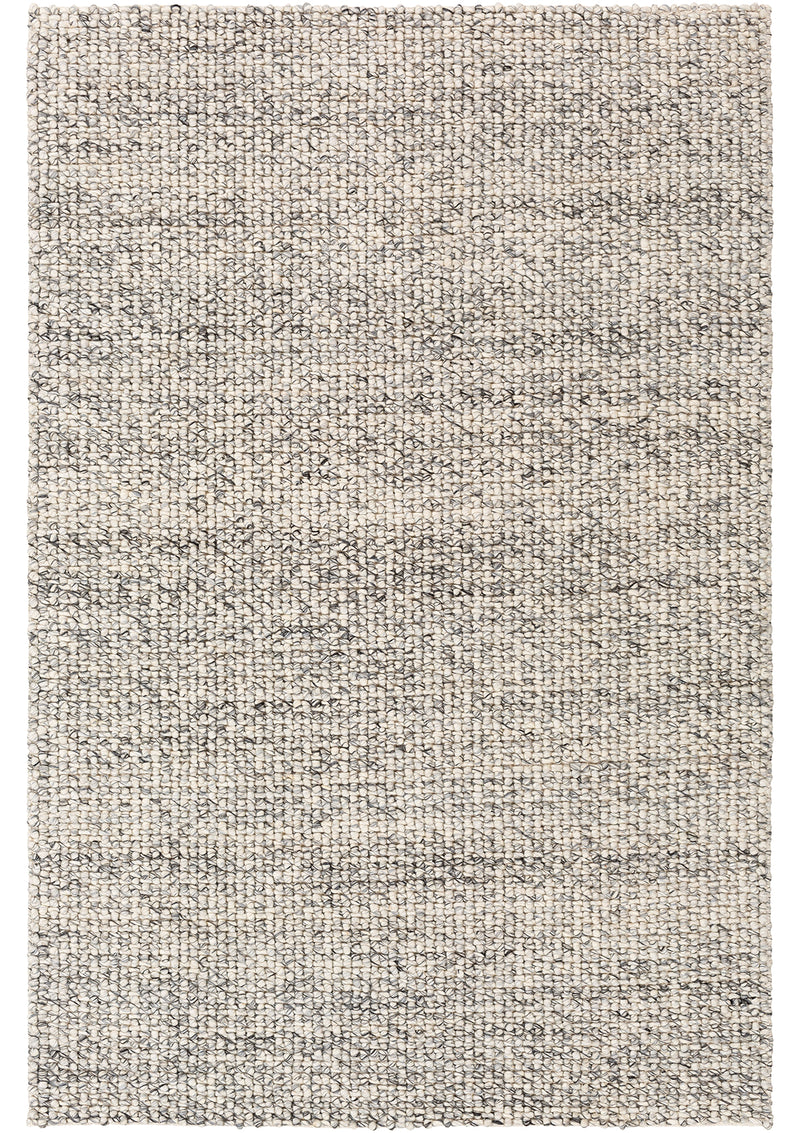 This 0.5" thick rug comes in subtle charcoal and grey tones. 