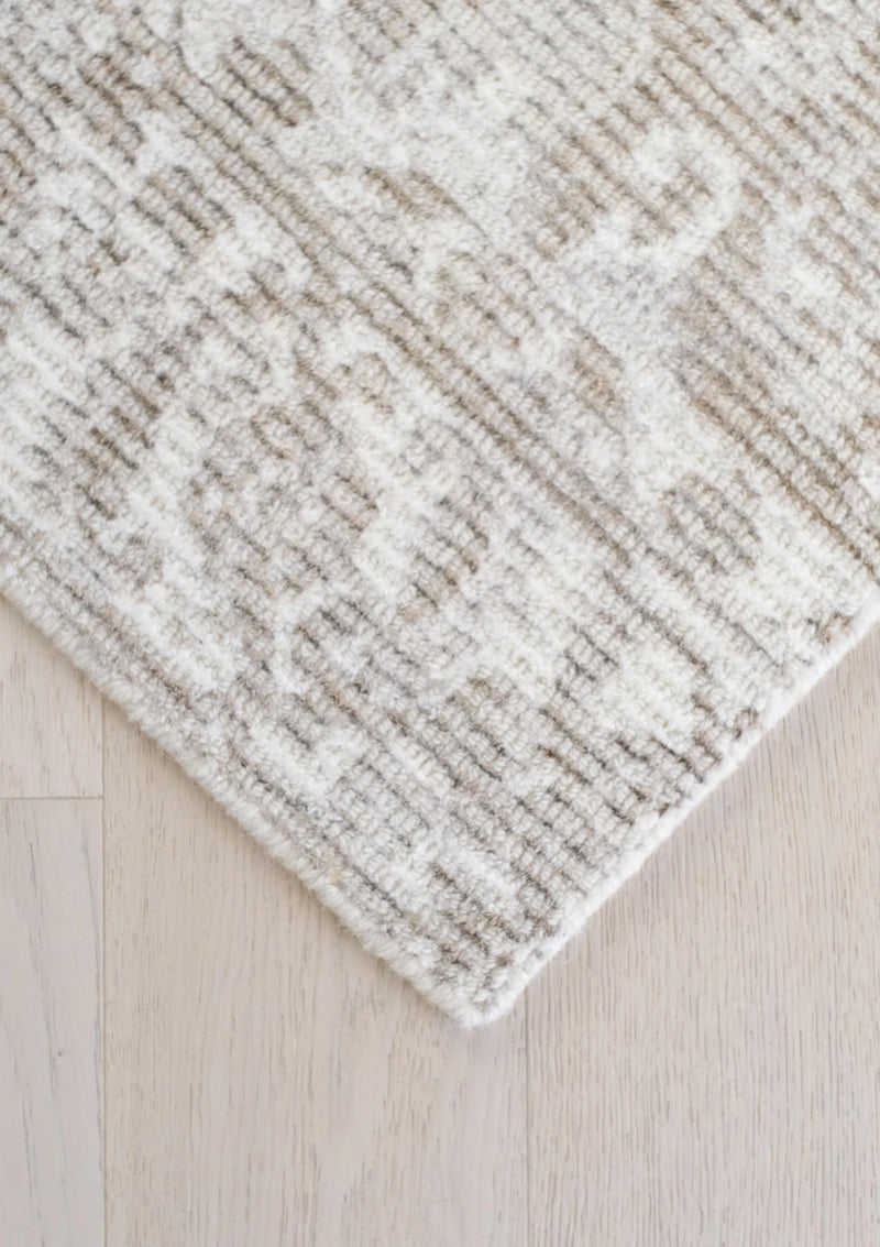 The Lauren Rug is a traditional style rug that is loomed. 