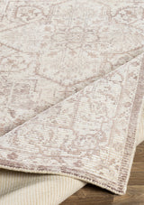 The Lauren rug has a subtle fadded traditional pattern. 