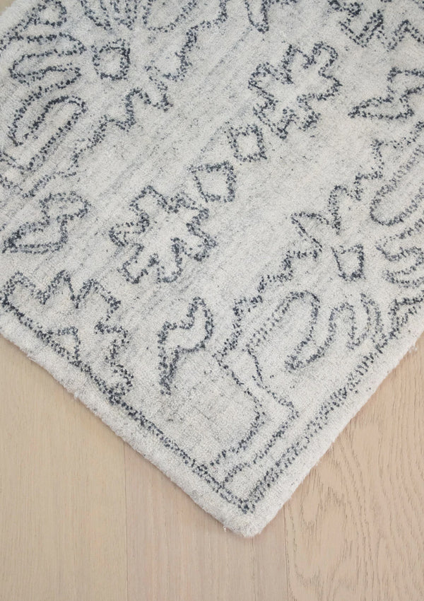 The Moorea Rug is made from hand knotted viscose and has a lustrous sheen.