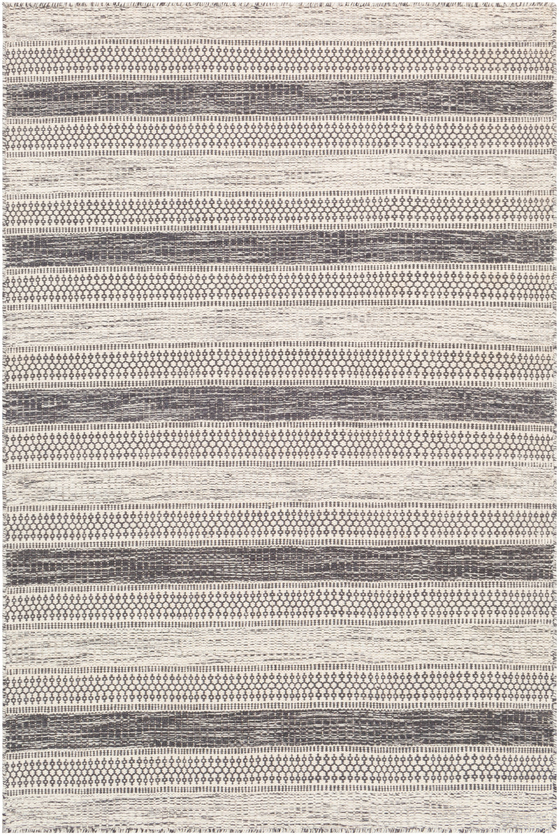The Nadi rug is made up of black and ivory tones. 