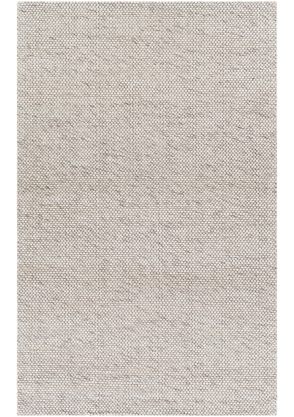 The Nowa rug comes in off white, charcoal, black, and grey tones. 