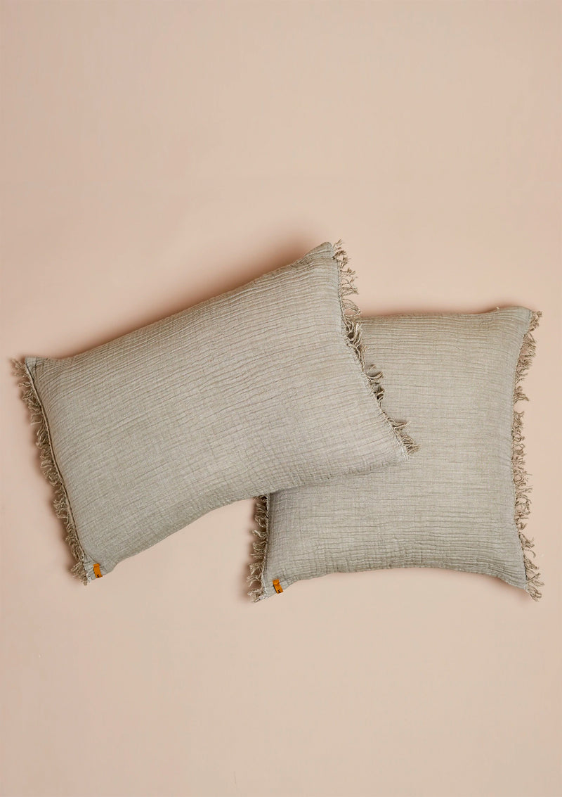 With two fringed ends the Olive Enes Cushion will add beautiful style to your home. 