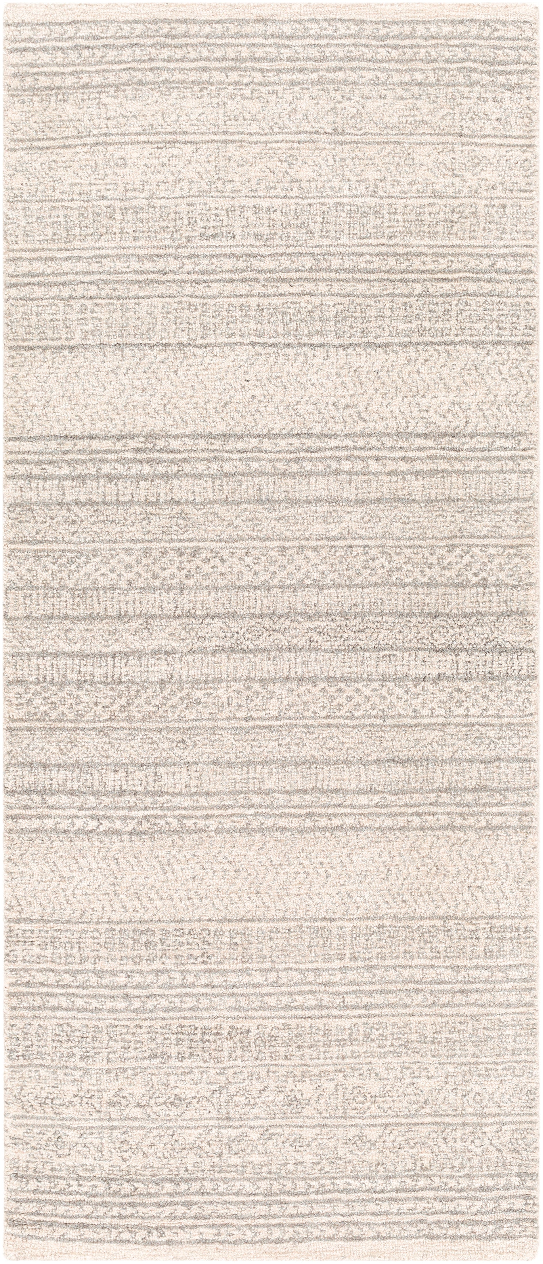 The Pakse Rug has a low pile and is hand tufted from 100% wool.