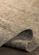 The Silas rug is made up of dusty sage and soft brown tones. 